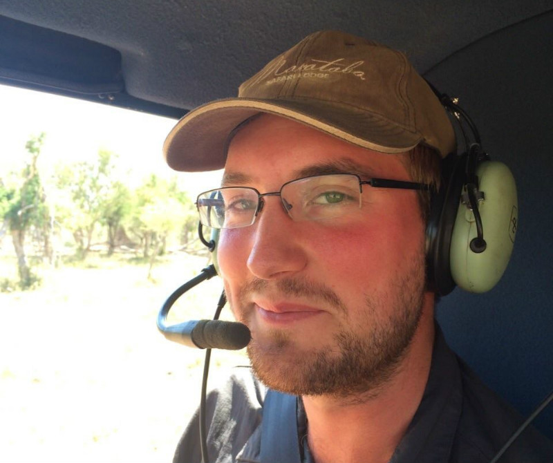Jomi Krobb in helicopter on rhino darting and game capture mission